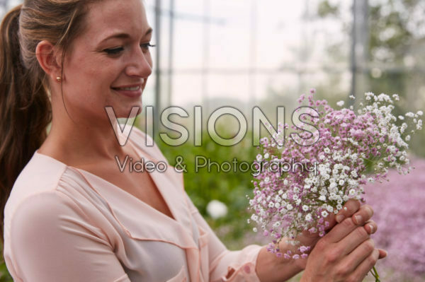 Lady holding Gypsophila bouquet Lady holding Gypsophila bouquet