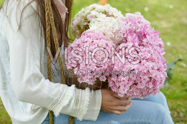 Lady with hydrangea flowers Lady with hydrangea flowers