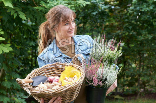 Young lady with flower bulbs Young lady with flower bulbs