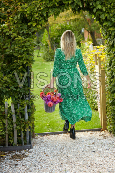 Young lady with Dahlia basket Young lady with Dahlia basket