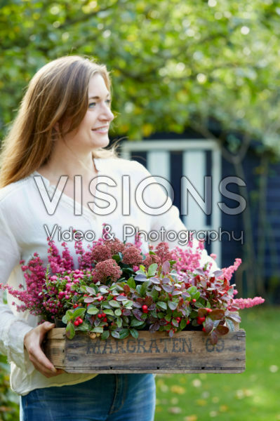 Young lady with autumn container Young lady with autumn container