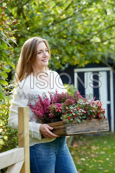 Young lady with autumn container Young lady with autumn container