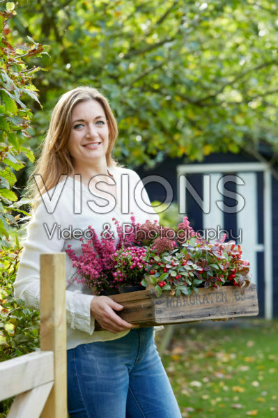 Young lady with autumn container Young lady with autumn container