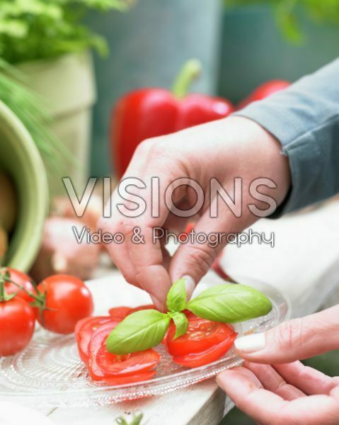 Fresh basil on tomatoes Fresh basil on tomatoes